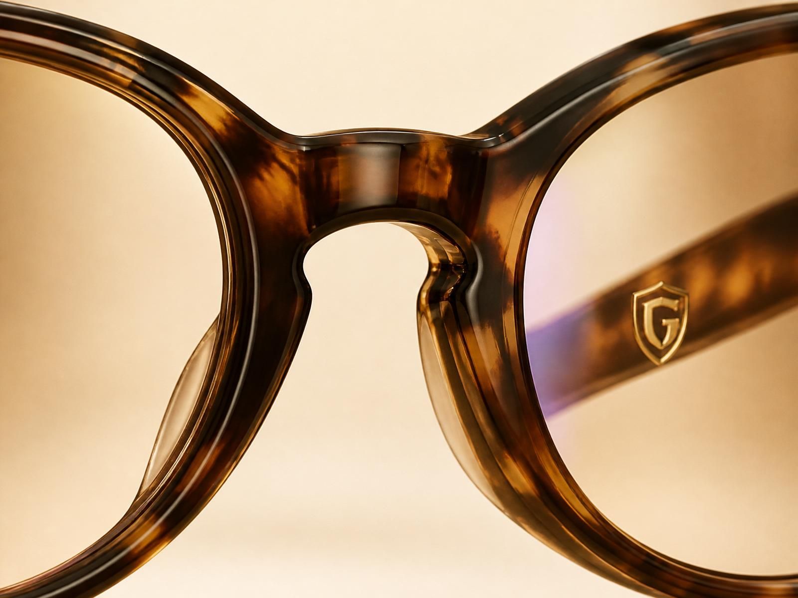 Women's Collection — tortoise acetate with gold temple engraving — bridge macro